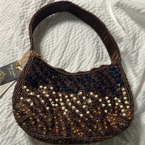 From India to you brown beaded half moon shoulder bag